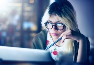 Woman Researching Recruiting Tools