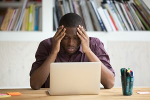 man frustrated with job